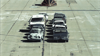 A dense traffic jam, cars barely moving.